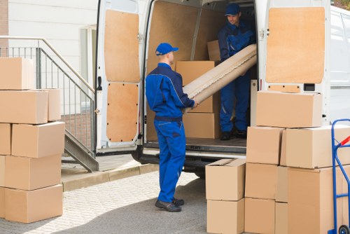 Man and van service loading furniture in Woodside