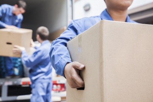 Customer storing items in a secure Woodside Storage unit