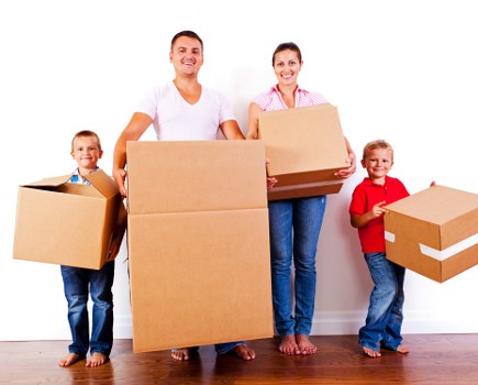 Professional removals and storage service in Woodside with packed moving boxes