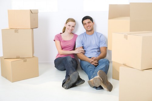 Professional packing services in Woodside preparing boxes for a residential move